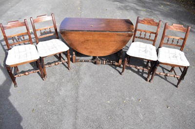 Lot 2462 - An 18th century style oak drop leaf gateleg...