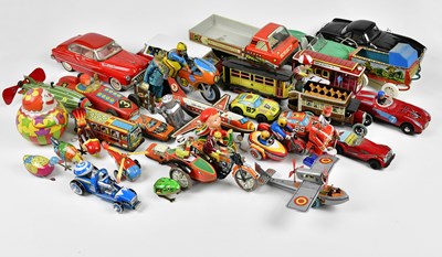 Lot 1100 - A large collection of tin plate vehicles,...
