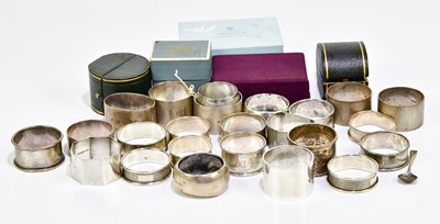 Lot 2151 - A large collection of hallmarked silver napkin...