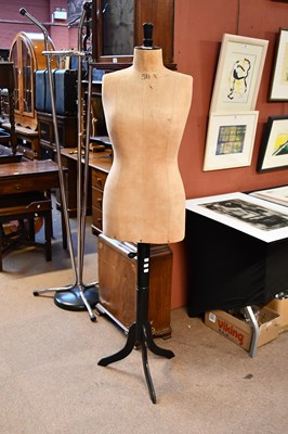 Lot 1486 - A vintage mannequin, on ebonised tripod stand,...