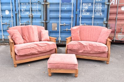 Lot 2598 - ERCOL; a pair of light elm and caned two...