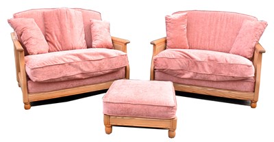 Lot 6712 - ERCOL; a pair of light elm and caned two...