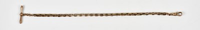 Lot 2199 - A yellow metal pocket watch chain and T bar,...