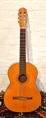 Lot 1292 - TENADA GUITARS; a model G705 classical guitar,...