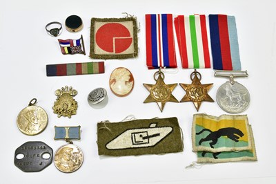 Lot 513 - A set of WWII medals in box of issue addressed...