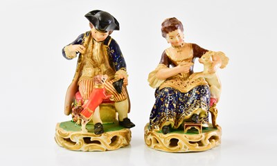Lot 1434 - A pair of early 20th century porcelain figures...