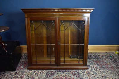 Lot 2464 - An early 20th century mahogany bookcase with...