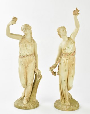 Lot 2161 - ROYAL WORCESTER; two large blush ivory figures...