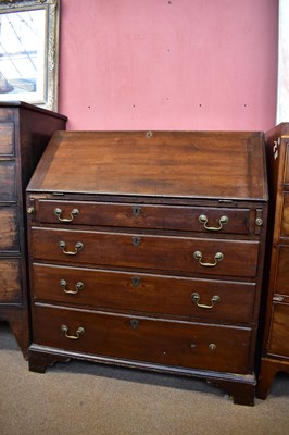 Lot 2401 - A 19th century bureau, the fall front over...