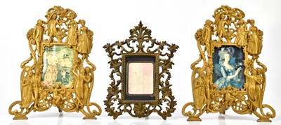 Lot 1389 - A pair of gilt metal easel back photograph...