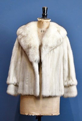 Lot 1028 - A short vintage silver fox fur coat trimmed...
