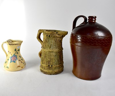 Lot 160 - A large dark brown stoneware jug