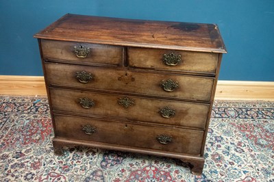 Lot 2348 - A Georgian mahogany chest of two short over...