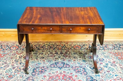 Lot 2357 - A 19th century mahogany drop-leaf sofa table...