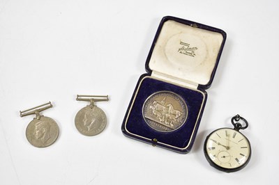 Lot 2035 - A George V hallmarked silver medal produced...