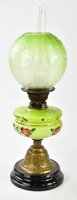 Lot 1180 - An early 20th century oil lamp, the globular...