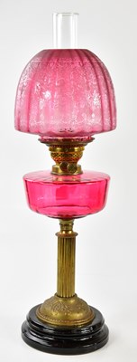 Lot 1184 - A late 19th century oil lamp, the dome shaped...