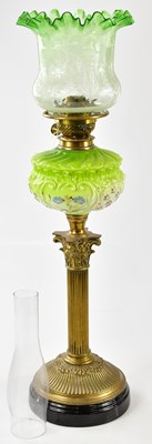 Lot 1186 - A Victorian oil lamp, the green and clear...