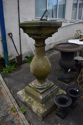 Lot 2295 - A slate sun-dial on stone pedestal,...