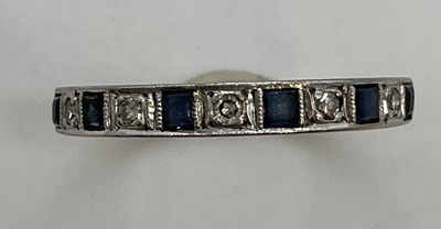 Lot 1228 - An 18ct yellow gold sapphire and diamond half...