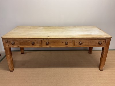 Lot 394 - Three drawer bleached top pine farm house...