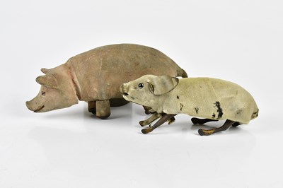 Lot 4377 - A vintage clockwork leather automation pig,...
