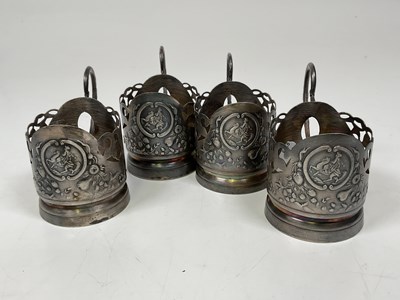 Lot 1027 - A set of four Scandinavian white metal cup...