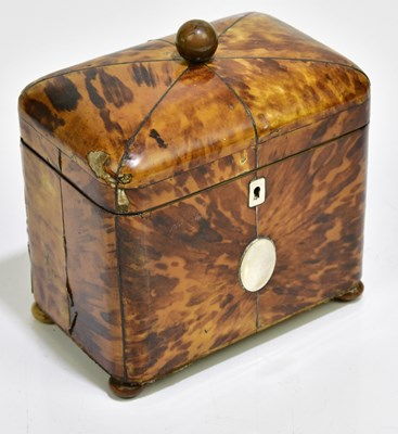 Lot 1002 - A George III tortoiseshell tea caddy of shaped...