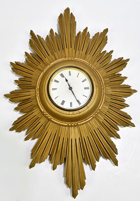 Lot 2289 - A 1920s/30s Art Deco gilt sunburst wall clock,...