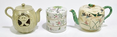 Lot 1598 - A Chinese Famille Rose three tier storage...
