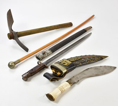 Lot 698 - A Gurka kukri knife with applied Nepal emblem...