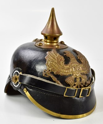 Lot 456 - A reproduction pickelhaube with replaced...