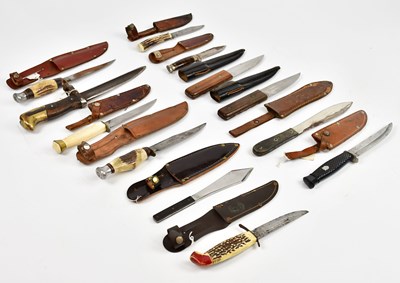 Lot 717 - A collection of military and other knives, two...