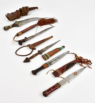 Lot 718 - A collection of African and Eastern daggers...