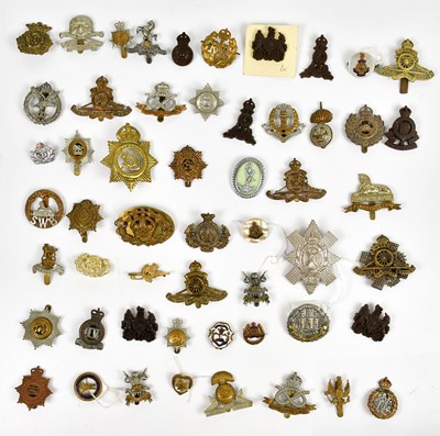Lot 510 - A collection of assorted cap badges, various...