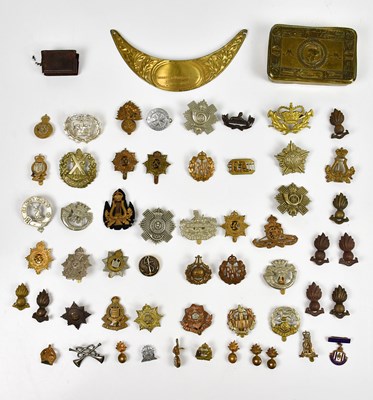 Lot 511 - A collection of assorted cap badges, various...