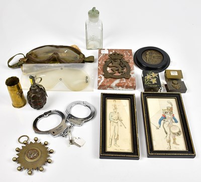 Lot 427 - A collection of militaria accessories,...