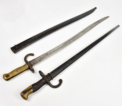 Lot 734 - A 19th century French Chassepot bayonet with...