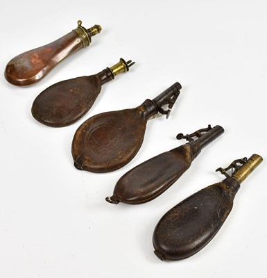 Lot 430 - A collection of powder flasks, including a...