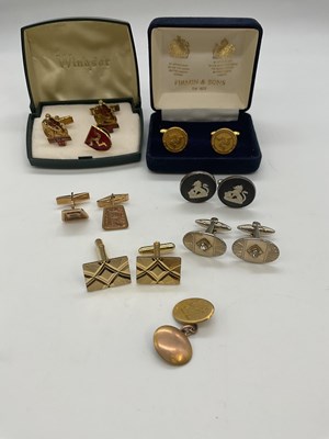 Lot 1192 - A group of cufflinks including a pair of 9ct...
