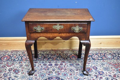 Lot 2368 - An 18th century oak lowboy with single drawer...