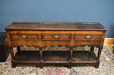 Lot 2358 - An 18th century oak dresser base with three...