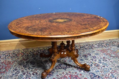 Lot 2467 - A Victorian inlaid walnut tilt-top loo table,...