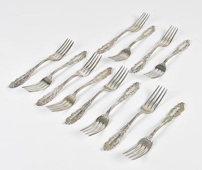 Lot 2380 - A set of twelve forks, stamped sterling silver,...