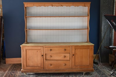 Lot 6491 - An old pine dresser with associated plate rack...