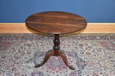 Lot 6529 - A Georgian oak tripod table, diameter of top...