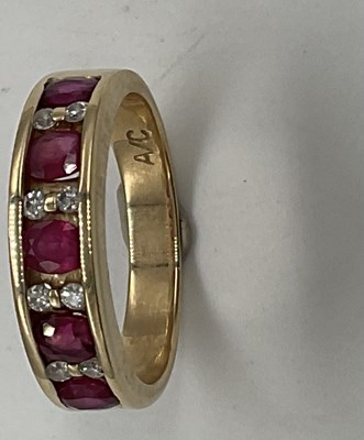 Lot 1207 - A 14ct yellow gold ruby and diamond half...
