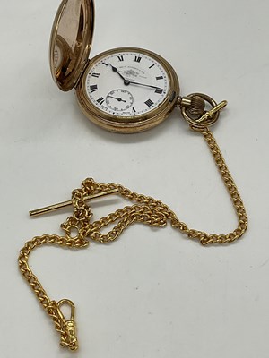 Lot 1297 - A gold plated full hunter crown wind pocket...