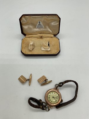 Lot 1277 - A pair of 9ct yellow gold cufflinks, approx. 2....