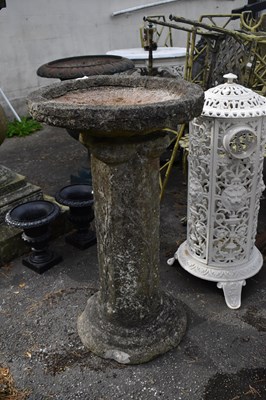 Lot 2315 - A reconstructed stone bird bath, height 80cm.